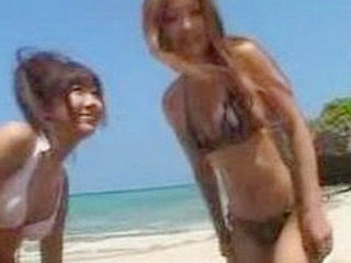 Japan Beauties go Wild on Public Beach in XXX Orgy with One Lucky Man
